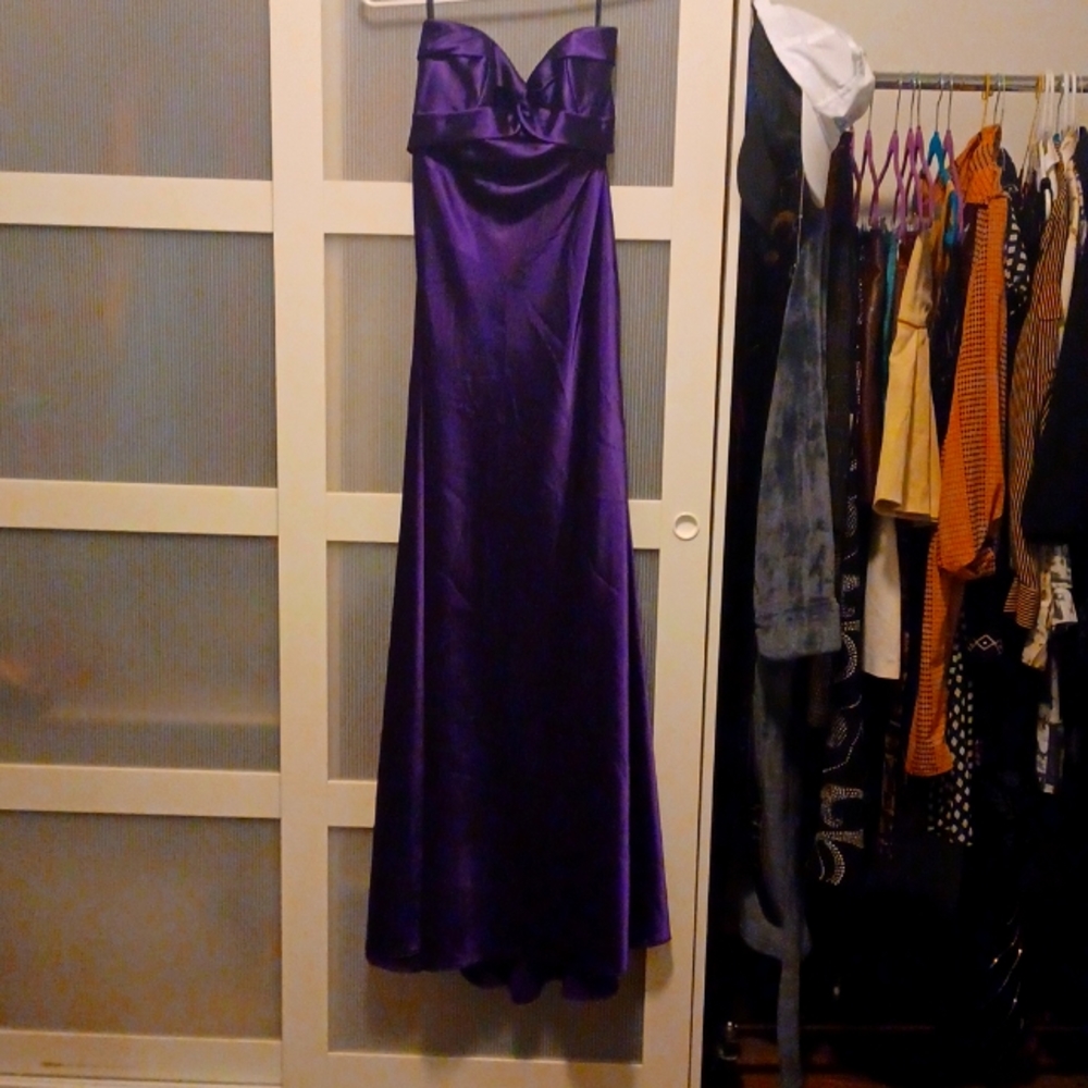 Floor length purple gown with strappy back